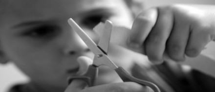 child using scissors